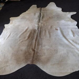 Gentle Doe like Tones grace this lovely rug - A beautiful soft subtle & stylish premium Cowhide Rug