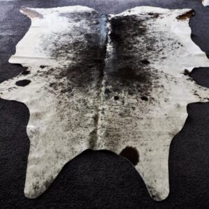With a  Neat JC Brand - This hide has a Special Appeal - A lovely Premium Quality Salt and Pepper Tri Coloured Cowhide Rug