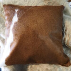 A Rich Brown and White 50cm Sq Cowhide Cushion