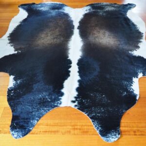 A Huge and Beautiful Charcoal Based Tri Coloured Cowhide Rug