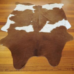 A Lovely thick soft Brown & White Winter Coat -  A great size a lovely shape - A Beautiful Apartment Sized Cowhide Rug