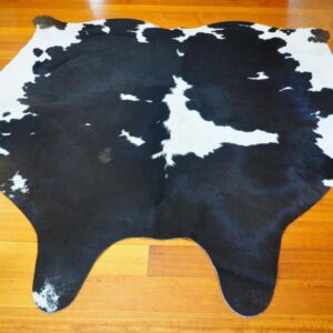 A Classic Friesian Cowhide Rug - A Beautiful Glossy Jet Black & Snow White Coat