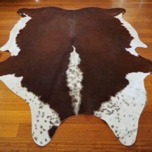 A Silken Coat - A Beautiful Curl - A Gorgeous Hereford Cowhide Rug