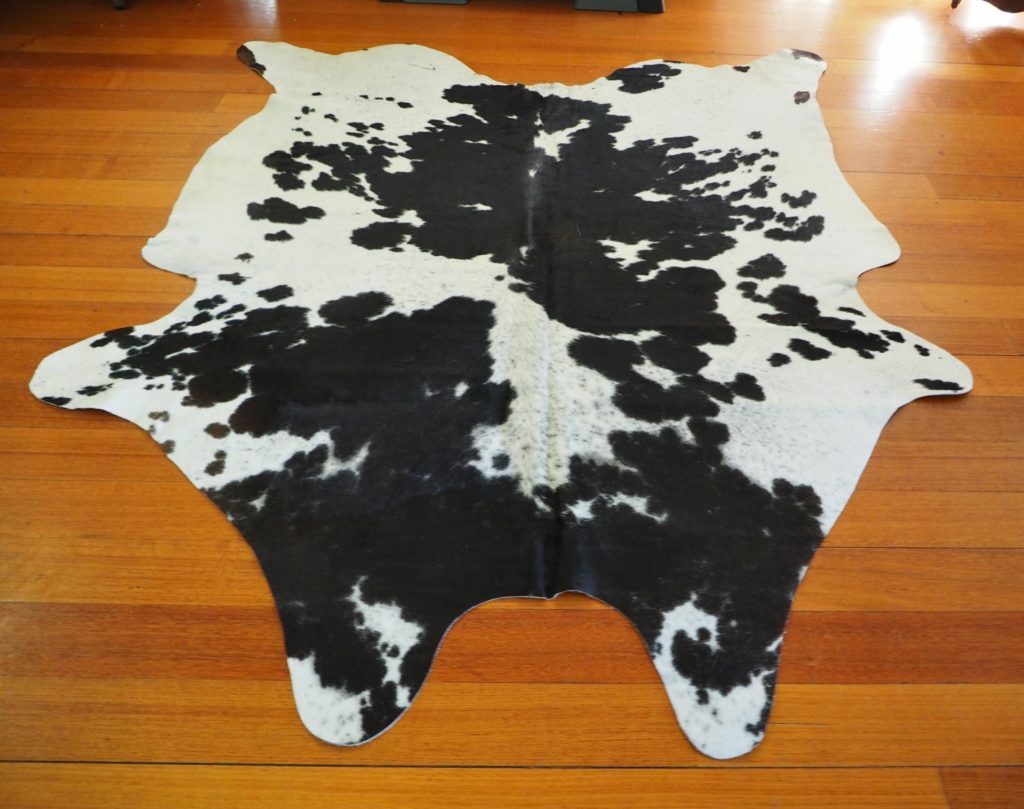 A Simply Beautiful Jet Black & Pure White Friesian Cowhide Rug