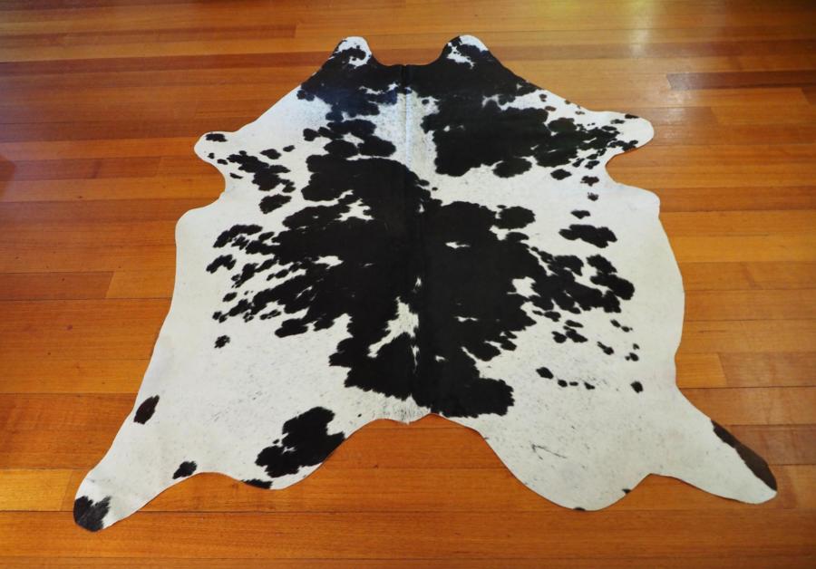 A Simply Beautiful Jet Black & Pure White Friesian Cowhide Rug