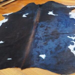A Deep Chocolate Brown, A red Centre Blaze & Speckled Flanks - A Wonderful Premium Cowhide Rug