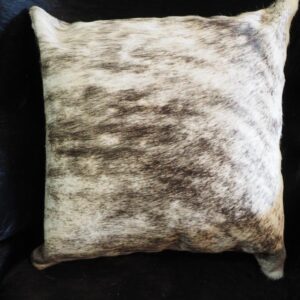A Beautiful Cowhide Cushion Cover featuring a grey wave over a light base