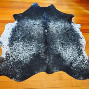 A Beautiful Symmetrically Marked Black and White Salt & Pepper Cowhide Rug