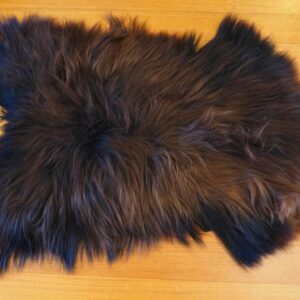 A Stunning Rust &Â Black Natural  Long Wool Icelandic Sheepskin Rug