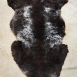 A Strikingly Marked Cocoa Brown Rare Breed Sheepskin Rug
