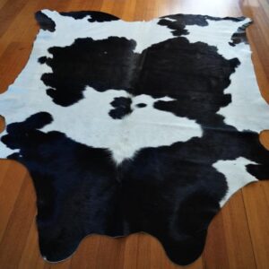 A Classic Friesian Hide - A Beautifully Balanced Cowhide Rug