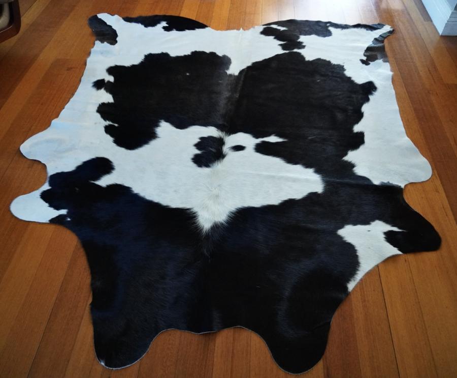 A Classic Friesian Hide - A Beautifully Balanced Cowhide Rug