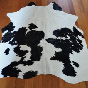 A Beautiful Apartment Sized Friesian Cowhide Rug - Perfect for the smaller space