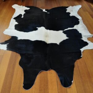 Jet Black & Rich Buttermilk - A Gorgeous Friesian Cowhide Rug