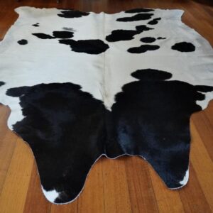 A Big And Beautifully Balanced Classic Country Cowhide Rug