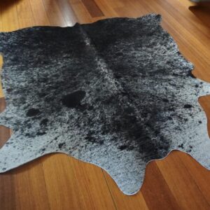 A Lovely Neat Salt and Pepper Apartment Size Cowhide Rug