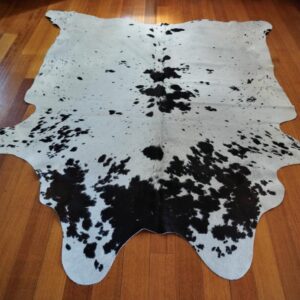 A Beautiful Hide with the smoothest of Coats - Pure White With Stunning Jet Black Markings - A Premium Quality Cowhide