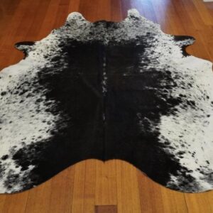Stars Break The Black Heart of This Beautiful Salt & Pepper Cowhide Rug