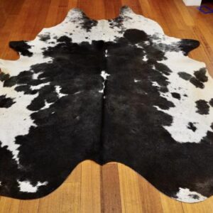 A Lovely Big Black  & White Hide with a Beautiful Charcoal Textured Star Studded Centre