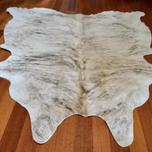 The Perfect Beach House Hide - A Beautiful Wave over a Pale Sandy Base - A Premium Cowhide Rug