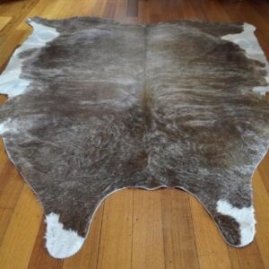 A Wondefuly Rippling Winter Coat - A Rare & Unusual Ginger Brindled Cowhide Rug