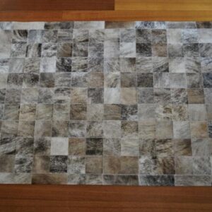 Exotic Hides Combine to create this Beautiful Cowhide Patchwork Rug
