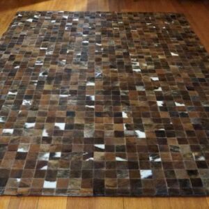 Exotic BRindled Hides are crafted with an eye for balance in this gorgeous Patchwork Cowhide Rug