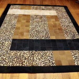 A Touch of the Wild with Civilized Style - A Gorgeous Leopard Print & Black Cowhide Rug