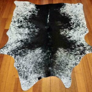 A Gorgeous Smaller Sized Speckle Park Cowhide Rug
