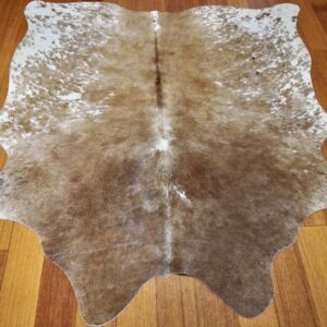 A Beautiful Smaller Sized Speckle Park Cowhide Rug