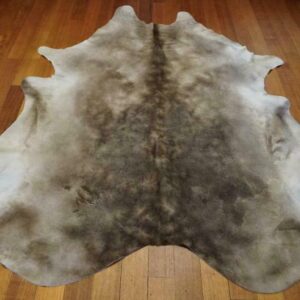 A Rare & Unusual Colouring - A Silken Coat - A Superb Hand Selected Cowhide Rug