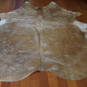 A Wonderful White White Wave washes over this gorgeous Ginger Brown Premium Cowhide Rug