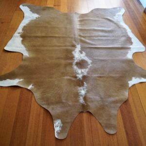A Wonderful Neat Apartment Sized Cowhide Rug