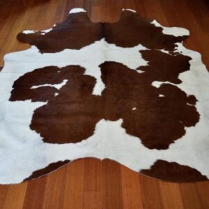 A Classic Brown & White Cowhide Rug -