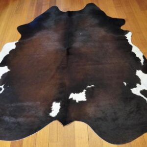 A Striking Tri Coloured Cowhide Rug