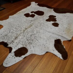 A Soft & Silken Coat - A Bold Design. - A Beautiful Cowhide Rug