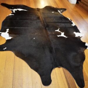 Dark Glossy Tones - A Beautiful Tri Coloured Cowhide Rug