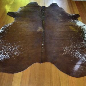 A Lovely Brown Based Tri Coloured Hide