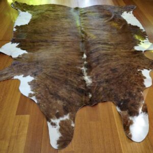 A Beautiful Brindling Wave over a Warm Tan Base - A Big & Balanced Cowhide Rug