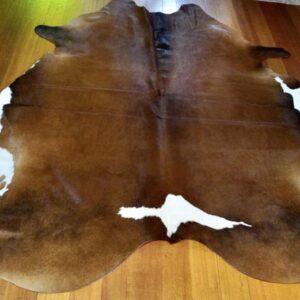 A Longhorn Graces the Rump of this Unique & Beautiful Cowhide Rug