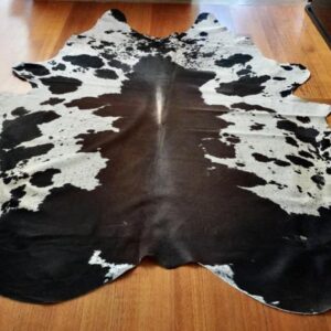 A Truly Massive Beautifully Balanced Tri Coloured Cowhide Rug