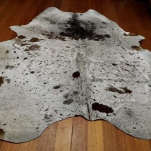 A Beautiful Silken Coat - A Natural Tri Coloured Cowhide Rug
