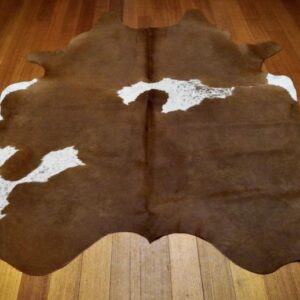 Perfect for the Nursery - A Really Neat Caramel & White Cowhide Rug