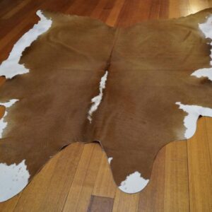 A Smooth Smart Summer Coat - A Beautiful Brown & White Cowhide Rug