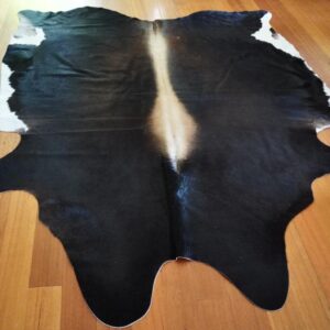 Dark Tones with a Broad Arrow Centre Blaze - A Simply Beautiful Cowhide Rug