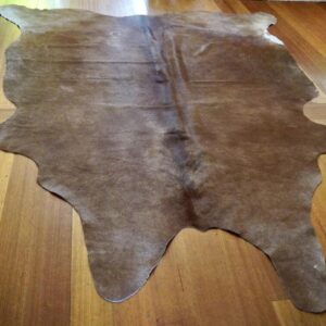 A Beautiful Natural Brown Textured Cowhide Rug