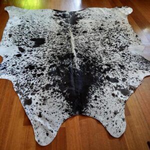 A Big & beautiful Tri Coloured Cowhide Rug