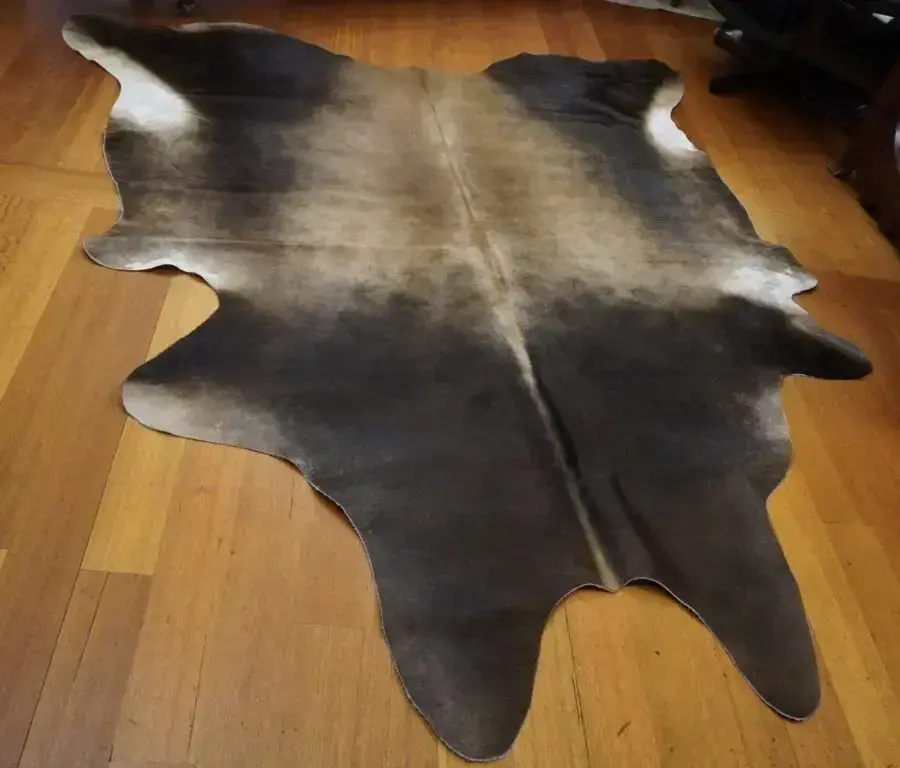 Big & Beautiful with Dark Smokey Toned Highlights - A Beautiful Cowhide Rug