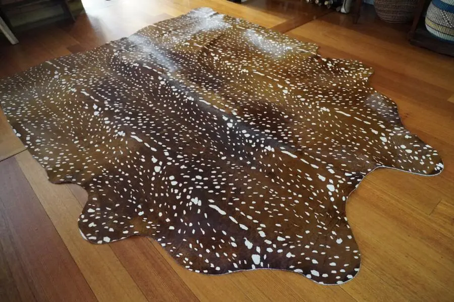 A Stunning Axis Deer Printed Cowhide Rug