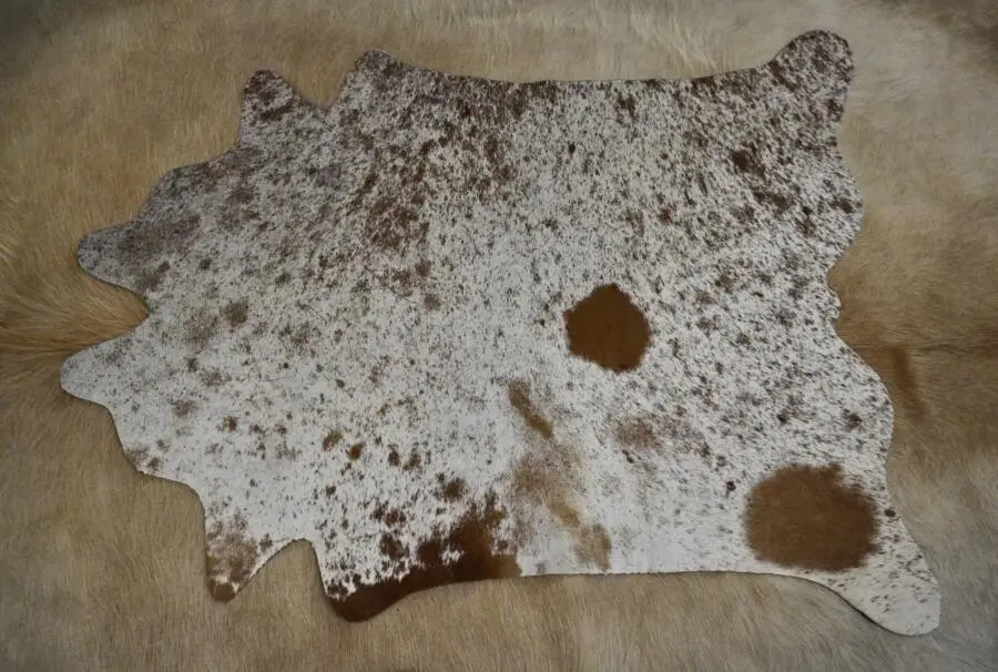 A Speckled Park Mini Cowhide Rug - For those Smaller Spaces